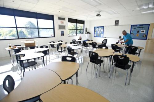A classroom with uniquely-shaped student desks