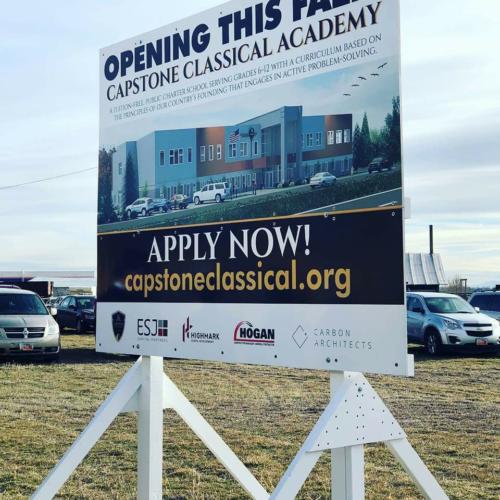 A sign advertising applications for Capstone Classical Academy