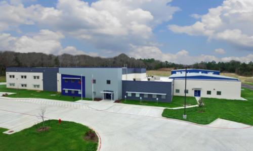 Aerial view of the school with blue skies in the background