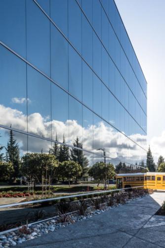 reflection of the sky on exterior of the school building