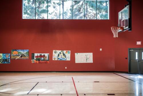 profile view of the free throw line and basketball hoop