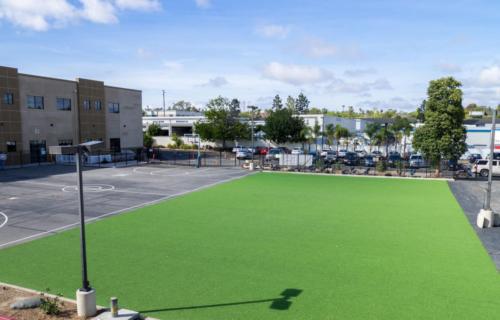 large field adjacent to the basketball court