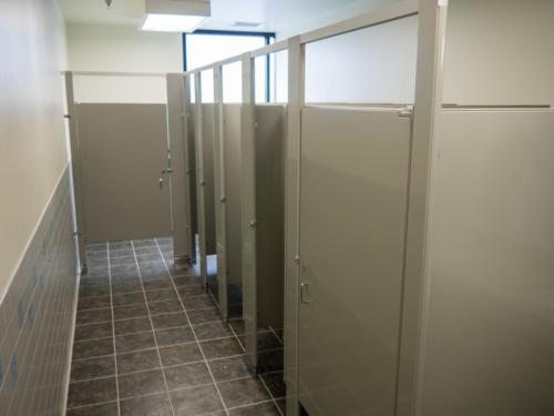 restroom with stall doors all closed