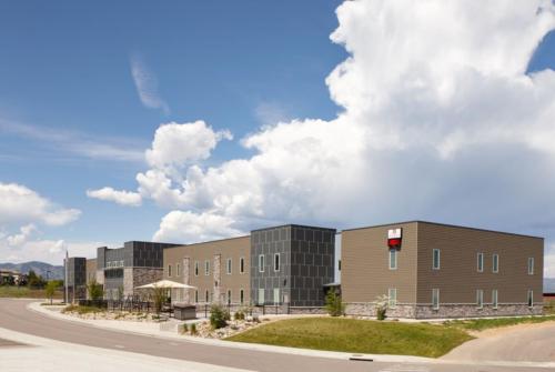 Wide angle view of school exterior and the school grounds