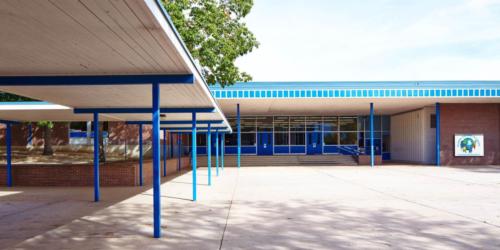 view of school entrance from courtyard