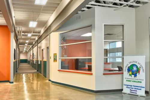 Lobby area with sign for Spanish and Chinese language immersion 