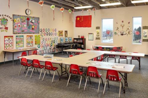 Chinese immersion class with kites hanging from the ceiling
