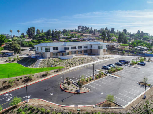Exterior view of school campus and parking