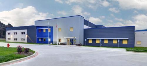 The exterior of Cumberland High School with blue walls of different shades