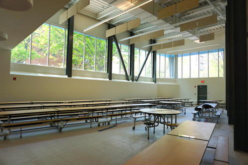 School cafeteria with unique decor hanging from the ceiling
