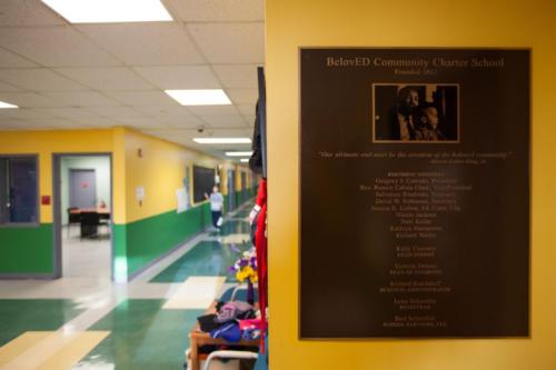 Close up view of a placard commemorating the school opening