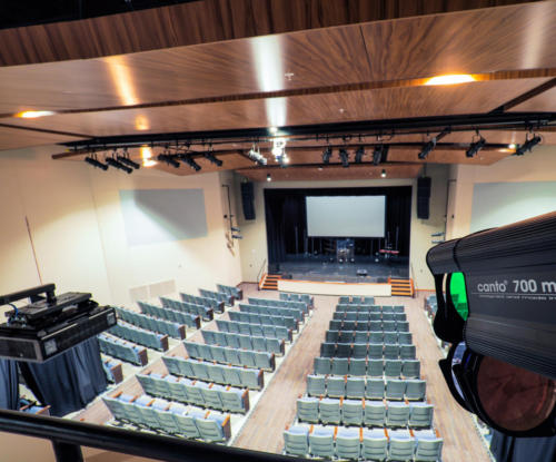 View of the auditorium and stage from the lighting tech's perspective