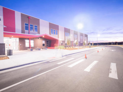 View of the school exterior and pickup/drop-off area